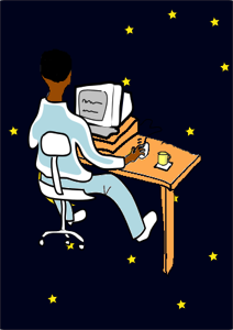 man on computer at night